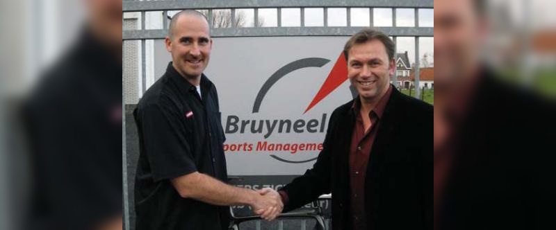 David Zimberoff (left) and Johan Bruyneel (right) seal the deal