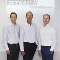 Jörg Mayer (links) und Michael Burk (rechts) werden mit der 21sportsgroup Mitglied bei STMI